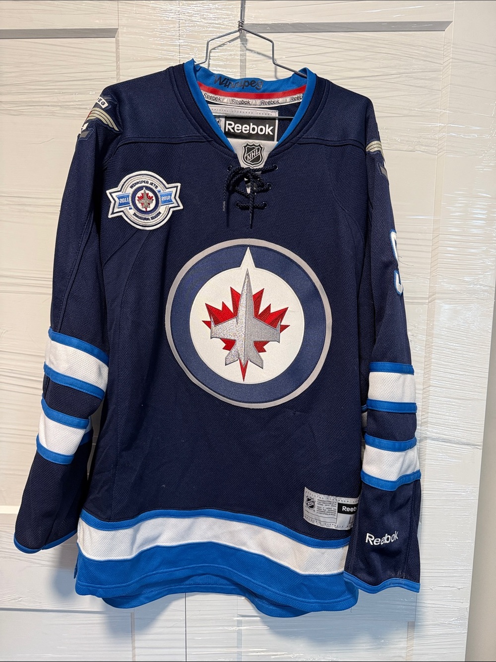 Reebok Men’s Navy and White Winnipeg Jets Hockey Sweater